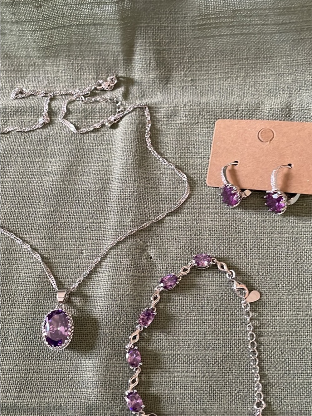 Sterling Silver jewelry set featuring Amethyst Stone & white crystals